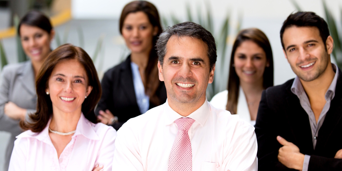 Family in front of house